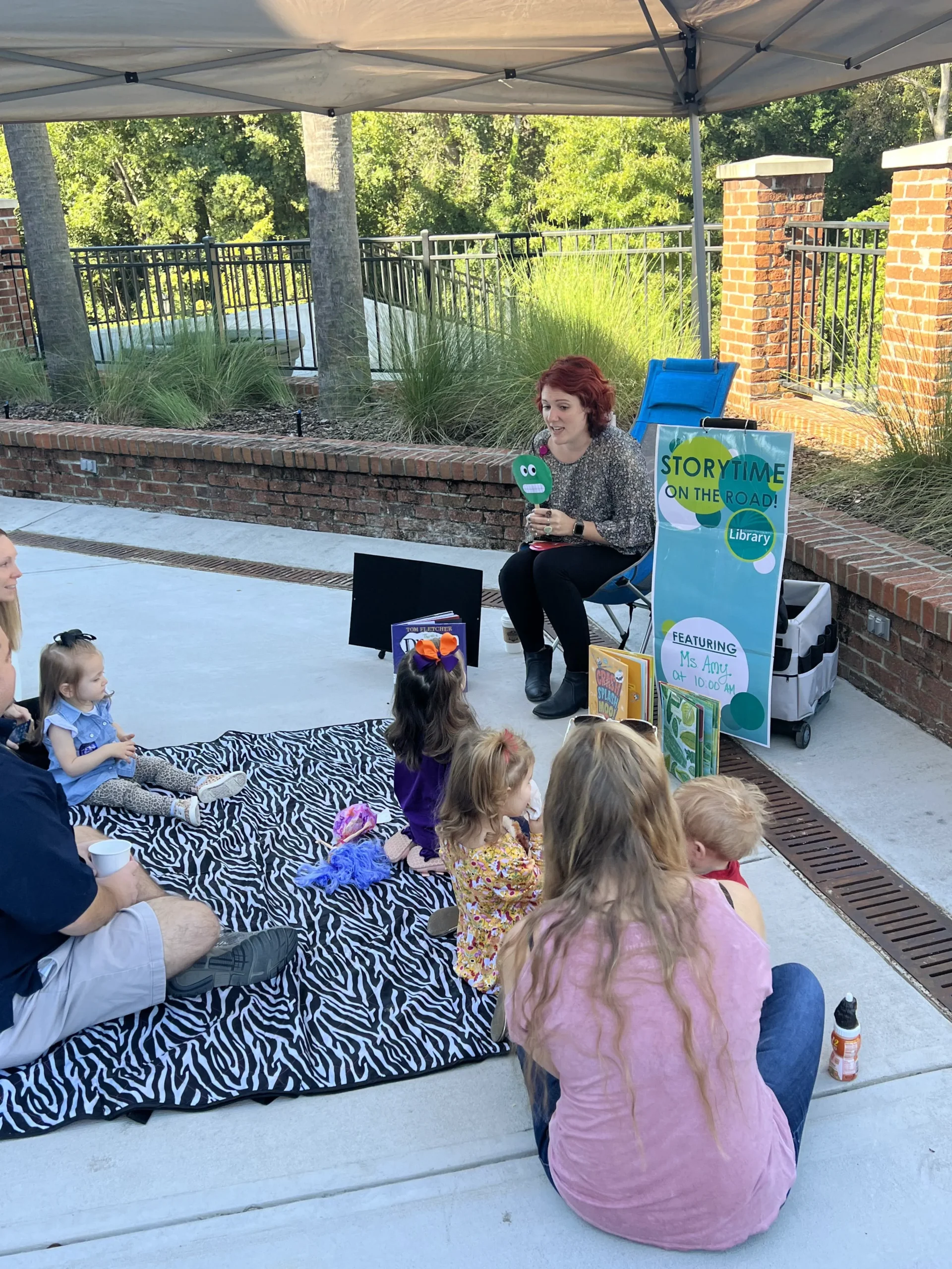 library staff hosting storytime at the Market at Icehouse in Lexington